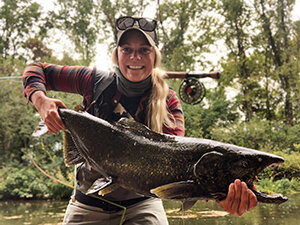 Angler with Chinook salmon