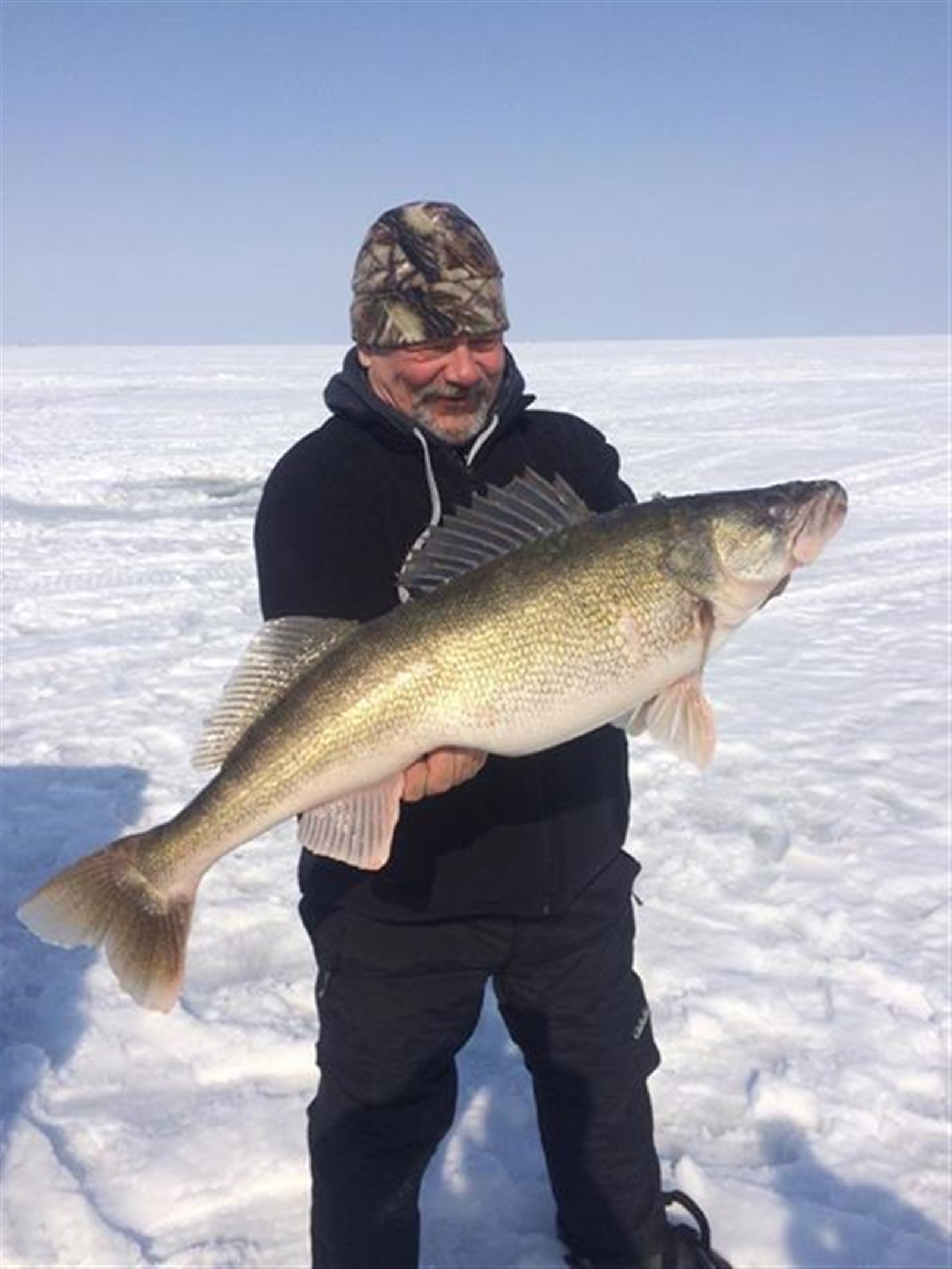 Bob Rustowicz of Cheektowaga shows off a 14.67-pound walleye he caught off Hamburg on Lake Erie last week. He was using a gold Swedish pimple. It took over first place in the Capt. Bob's Outdoors contest and is third place in the NYS Winter Classic competition. Yes, third.