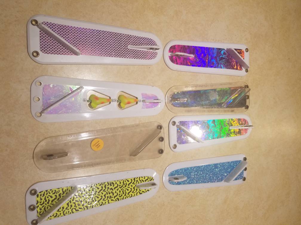 Reels, spoons, flashers and slide divers for sale. Classifieds Buy, Sell, Trade or Rent