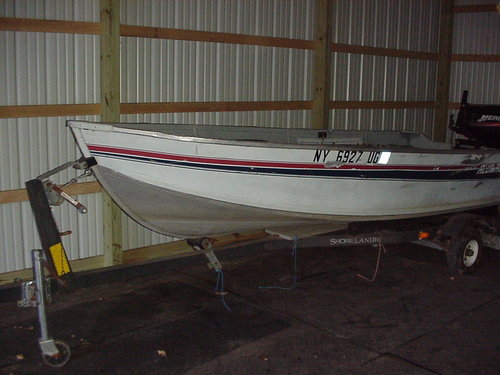 14 foot Alumacraft boat with 25 HP 4 stroke Mercury 