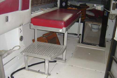 bench seat I fabricated to keep buddys out of rain etc 001.JPG