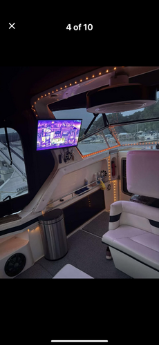 Boat - inside - TV & helm.PNG